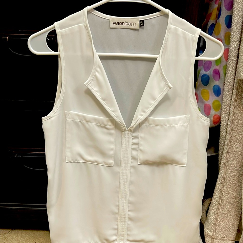 White sleeveless blouse